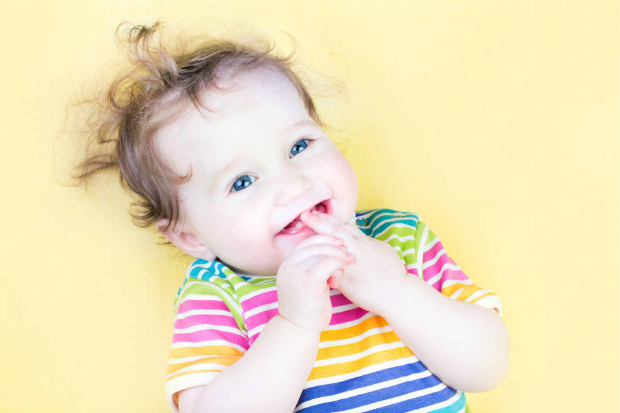 Sorrisi in estate: proteggere i denti dei bambini a partire dalla dentizione